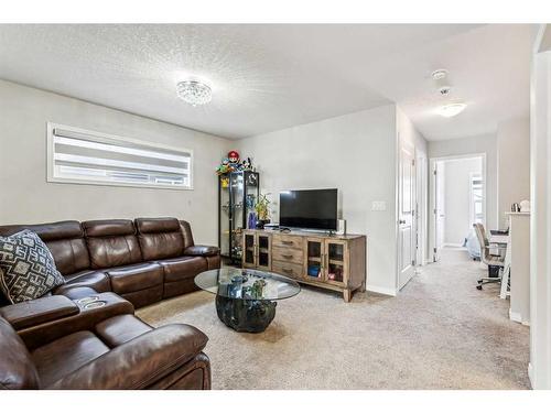 52 Chelsea Cape, Chestermere, AB - Indoor Photo Showing Living Room