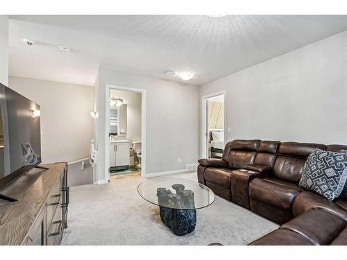 52 Chelsea Cape, Chestermere, AB - Indoor Photo Showing Living Room