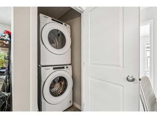 52 Chelsea Cape, Chestermere, AB - Indoor Photo Showing Laundry Room