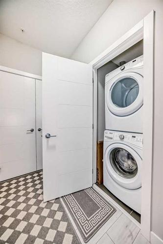 201-20 Sage Hill Terrace Nw, Calgary, AB - Indoor Photo Showing Laundry Room