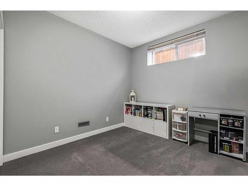 133 Drake Landing Heath, Okotoks, AB - Indoor Photo Showing Other Room