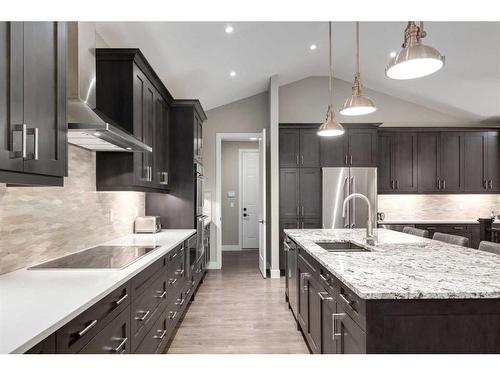 84 Clear Creek Place, Rural Rocky View County, AB - Indoor Photo Showing Kitchen With Upgraded Kitchen