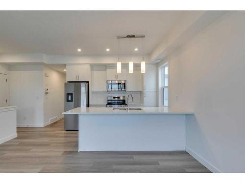 38-2117 81 Street Sw, Calgary, AB - Indoor Photo Showing Kitchen With Upgraded Kitchen