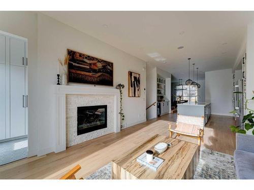 2227 32 Avenue Sw, Calgary, AB - Indoor Photo Showing Living Room With Fireplace