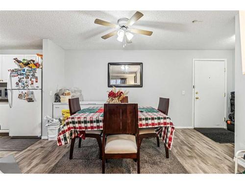 311-1000 Somervale Court Sw, Calgary, AB - Indoor Photo Showing Dining Room