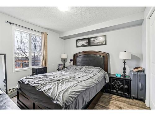 311-1000 Somervale Court Sw, Calgary, AB - Indoor Photo Showing Bedroom