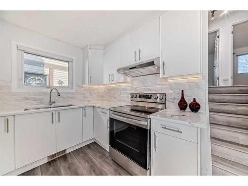 908 Riverbend Drive Se, Calgary, AB - Indoor Photo Showing Kitchen With Upgraded Kitchen