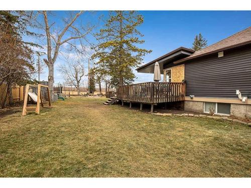 664 Royalite Way Se, Diamond Valley, AB - Outdoor With Deck Patio Veranda