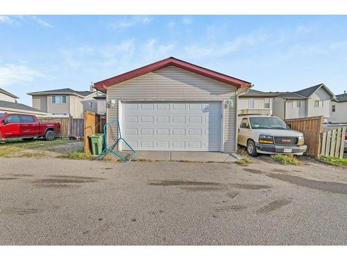 29 Crystal Shores Crescent, Okotoks, AB - Outdoor With Exterior