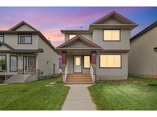 29 Crystal Shores Crescent, Okotoks, AB - Outdoor With Facade