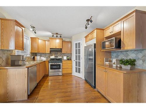 29 Crystal Shores Crescent, Okotoks, AB - Indoor Photo Showing Kitchen With Stainless Steel Kitchen