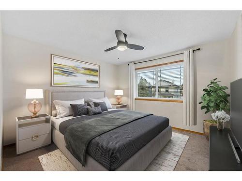 29 Crystal Shores Crescent, Okotoks, AB - Indoor Photo Showing Bedroom