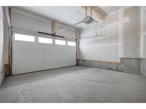 199 Silver Spruce Grove Sw, Calgary, AB - Indoor Photo Showing Garage