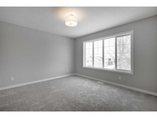 199 Silver Spruce Grove Sw, Calgary, AB - Indoor Photo Showing Other Room