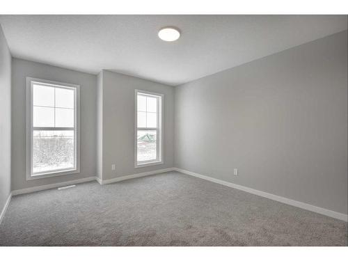 199 Silver Spruce Grove Sw, Calgary, AB - Indoor Photo Showing Other Room