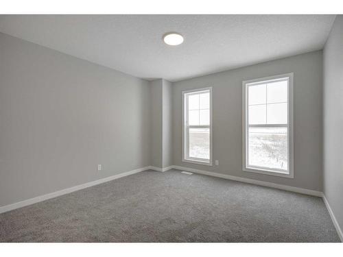 199 Silver Spruce Grove Sw, Calgary, AB - Indoor Photo Showing Other Room