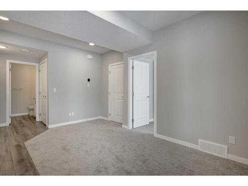 199 Silver Spruce Grove Sw, Calgary, AB - Indoor Photo Showing Other Room