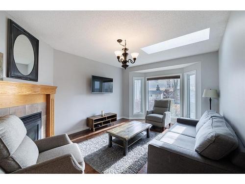 55 Covington Rise Ne, Calgary, AB - Indoor Photo Showing Living Room With Fireplace