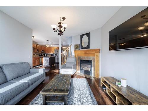 55 Covington Rise Ne, Calgary, AB - Indoor Photo Showing Living Room With Fireplace