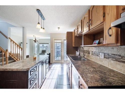 55 Covington Rise Ne, Calgary, AB - Indoor Photo Showing Kitchen With Double Sink