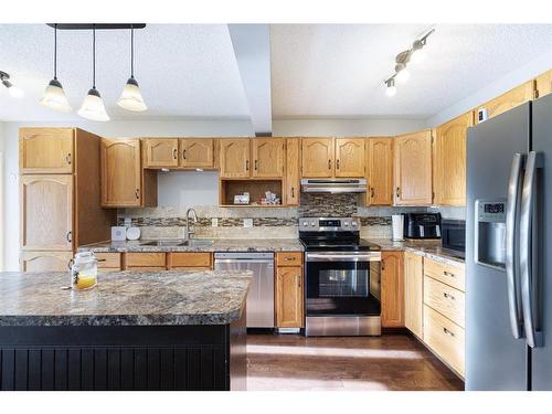 55 Covington Rise Ne, Calgary, AB - Indoor Photo Showing Kitchen With Stainless Steel Kitchen With Double Sink