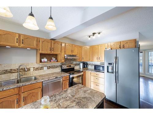 55 Covington Rise Ne, Calgary, AB - Indoor Photo Showing Kitchen With Stainless Steel Kitchen With Double Sink