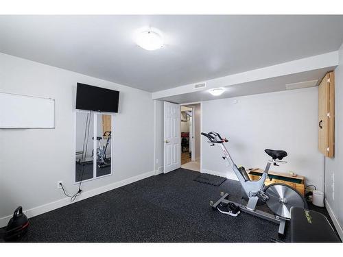 55 Covington Rise Ne, Calgary, AB - Indoor Photo Showing Gym Room