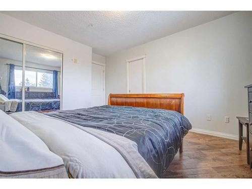 1011 Abbeydale Drive Ne, Calgary, AB - Indoor Photo Showing Bedroom