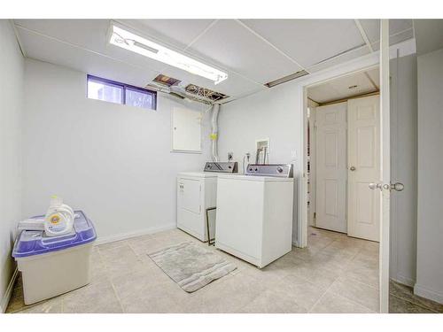 1011 Abbeydale Drive Ne, Calgary, AB - Indoor Photo Showing Laundry Room