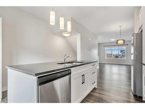 484 Canals Crossing Sw, Airdrie, AB - Indoor Photo Showing Kitchen With Stainless Steel Kitchen With Upgraded Kitchen