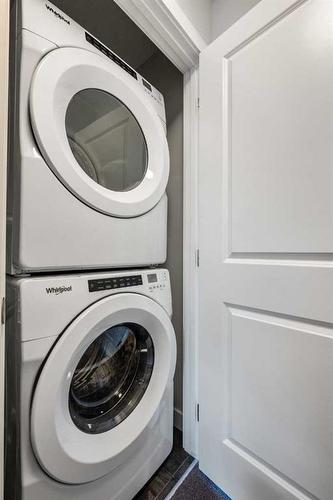 484 Canals Crossing Sw, Airdrie, AB - Indoor Photo Showing Laundry Room