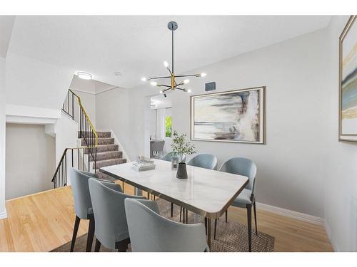 104-9803 24 Street Sw, Calgary, AB - Indoor Photo Showing Dining Room