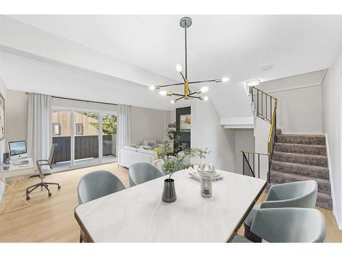 104-9803 24 Street Sw, Calgary, AB - Indoor Photo Showing Dining Room