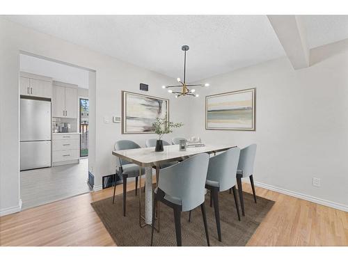 104-9803 24 Street Sw, Calgary, AB - Indoor Photo Showing Dining Room