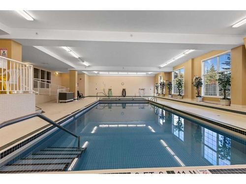 213-728 Country Hills Road Nw, Calgary, AB - Indoor Photo Showing Other Room With In Ground Pool