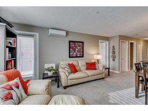 1313-81 Legacy Boulevard Se, Calgary, AB - Indoor Photo Showing Living Room