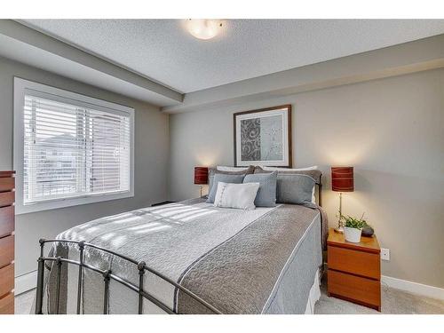 1313-81 Legacy Boulevard Se, Calgary, AB - Indoor Photo Showing Bedroom