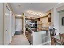 1313-81 Legacy Boulevard Se, Calgary, AB  - Indoor Photo Showing Kitchen With Stainless Steel Kitchen With Double Sink 