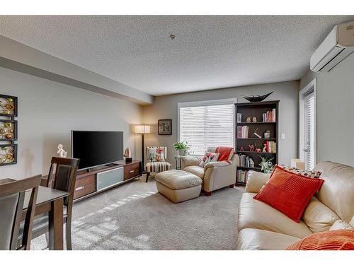 1313-81 Legacy Boulevard Se, Calgary, AB - Indoor Photo Showing Living Room