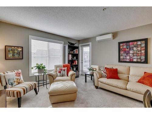 1313-81 Legacy Boulevard Se, Calgary, AB - Indoor Photo Showing Living Room