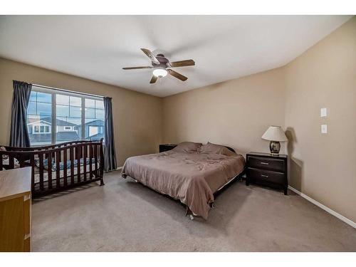 181 Luxstone Road Sw, Airdrie, AB - Indoor Photo Showing Bedroom