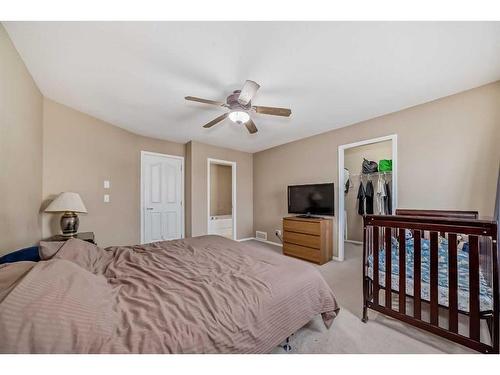 181 Luxstone Road Sw, Airdrie, AB - Indoor Photo Showing Bedroom