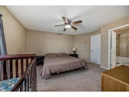 181 Luxstone Road Sw, Airdrie, AB - Indoor Photo Showing Bedroom