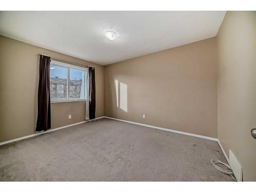 181 Luxstone Road Sw, Airdrie, AB - Indoor Photo Showing Other Room