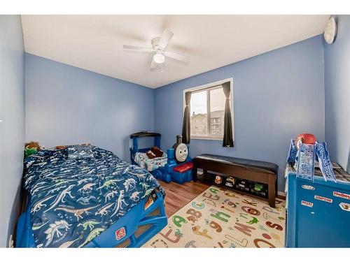 181 Luxstone Road Sw, Airdrie, AB - Indoor Photo Showing Bedroom