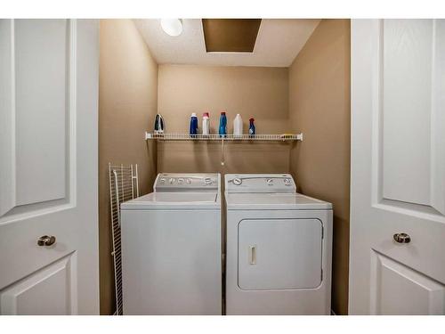 181 Luxstone Road Sw, Airdrie, AB - Indoor Photo Showing Laundry Room