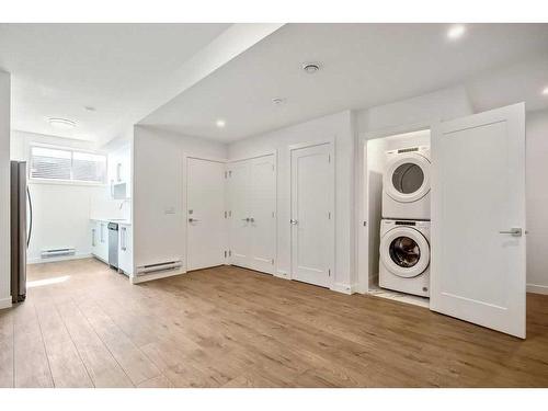 229 Creekside Drive Sw, Calgary, AB - Indoor Photo Showing Laundry Room