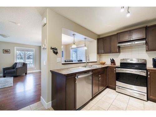 3049 Windsong Boulevard Sw, Airdrie, AB - Indoor Photo Showing Kitchen