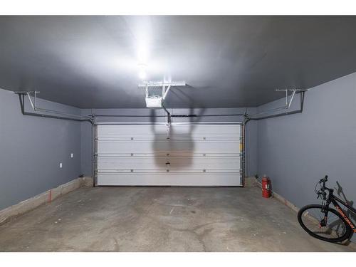 3049 Windsong Boulevard Sw, Airdrie, AB - Indoor Photo Showing Garage