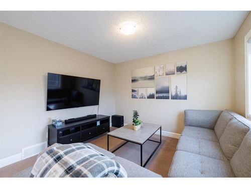 3049 Windsong Boulevard Sw, Airdrie, AB - Indoor Photo Showing Living Room